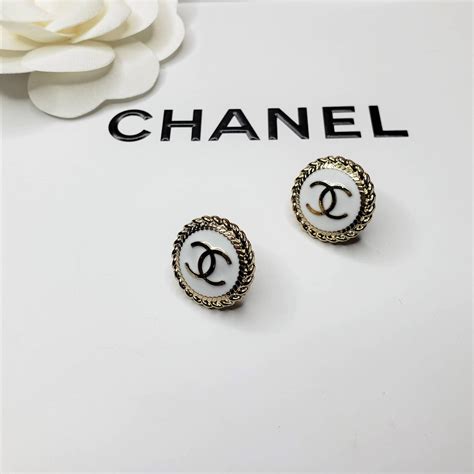 upcycled chanel button earrings.